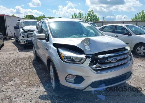 2017 Ford Escape Titanium z USA, uszkodzony, nr VIN 1FMCU9J93HUE43374